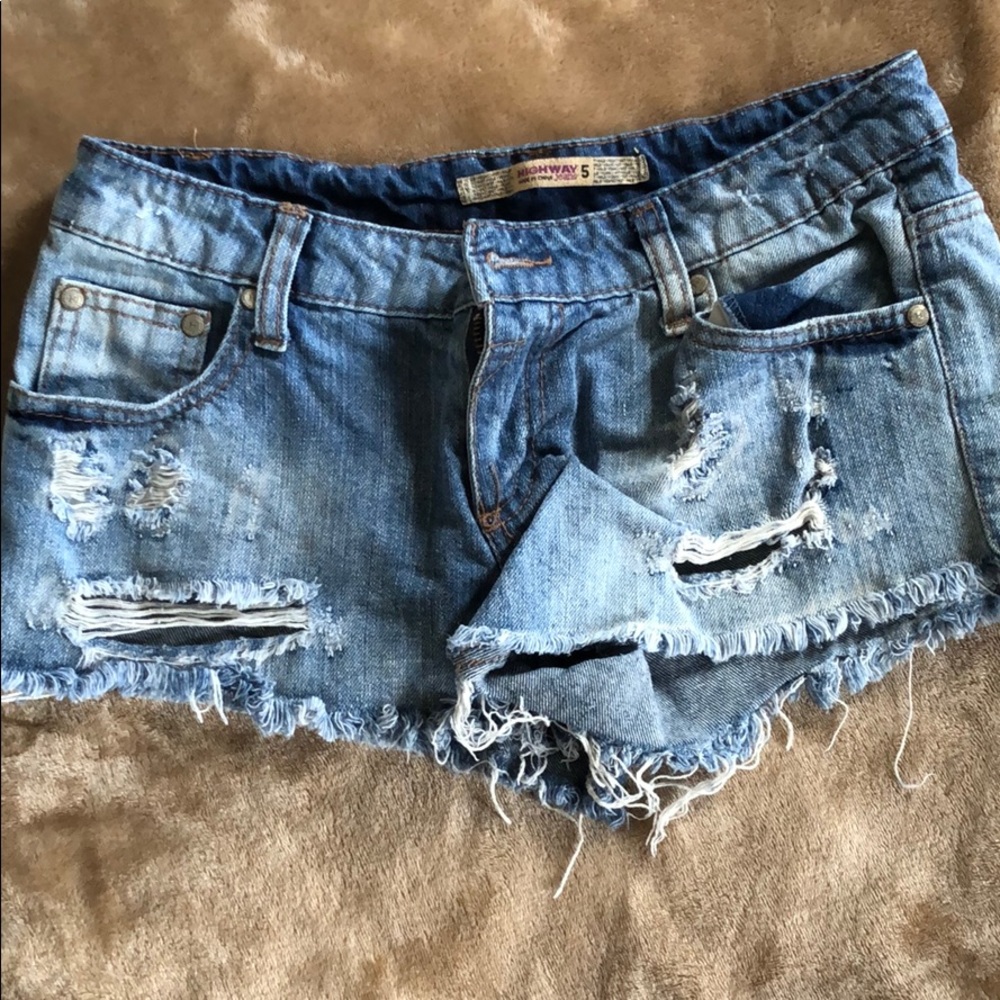 Destroyed denim shorts